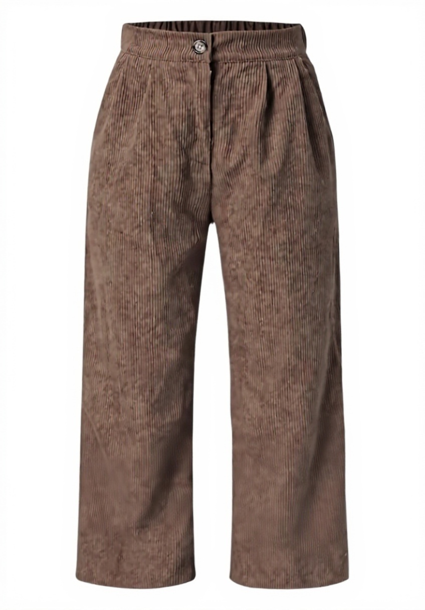 Donna che indossa i pantaloni della tuta YULONGESS in pile termico di colore cachi in un contesto casalingo